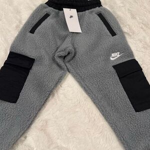 NWT Nike club fleece joggers with cargo pockets gray with black details size XS